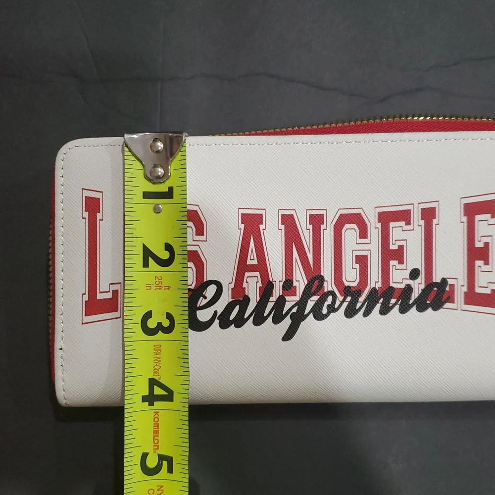 Los‎ Angeles California white coated canvas zip around red trim wallet brand new
